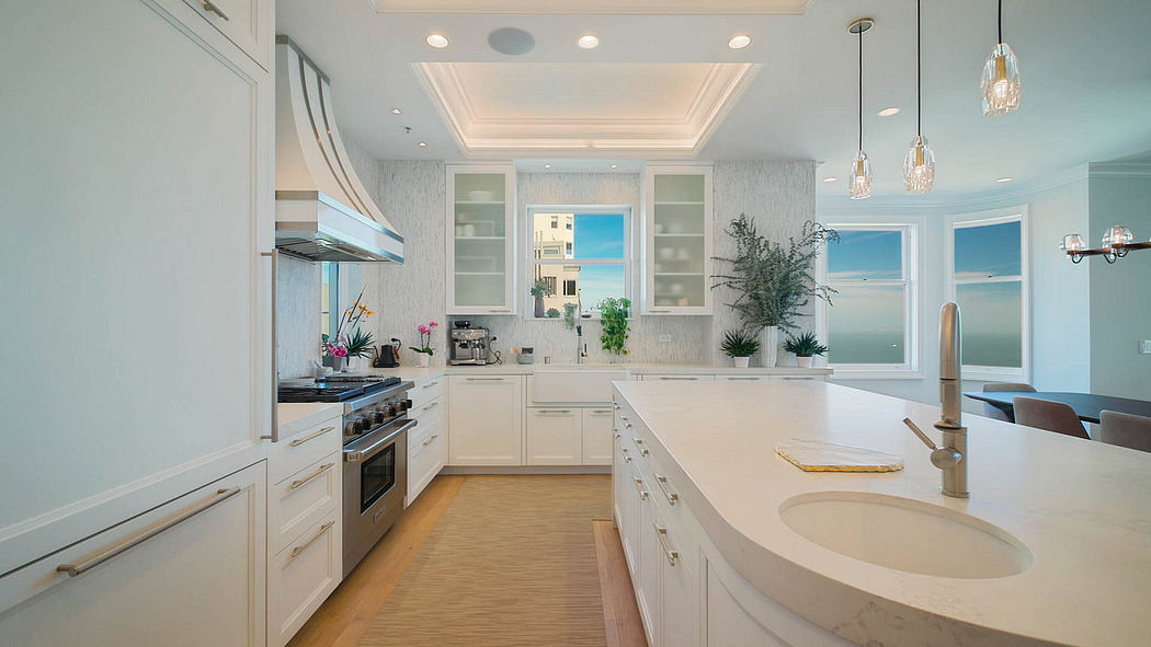 Bright, spacious kitchen with high ceilings, modern appliances, and abundant natural light.