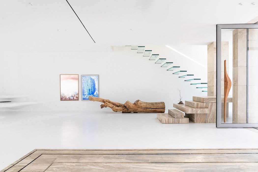Minimalist staircase with glass steps, wooden accents, and abstract artwork.