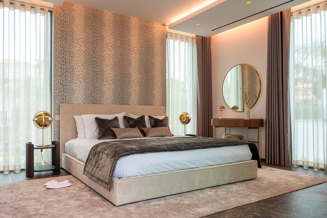 Luxurious bedroom with modern, warm-toned décor, floor-to-ceiling windows, and stylish furnishings.