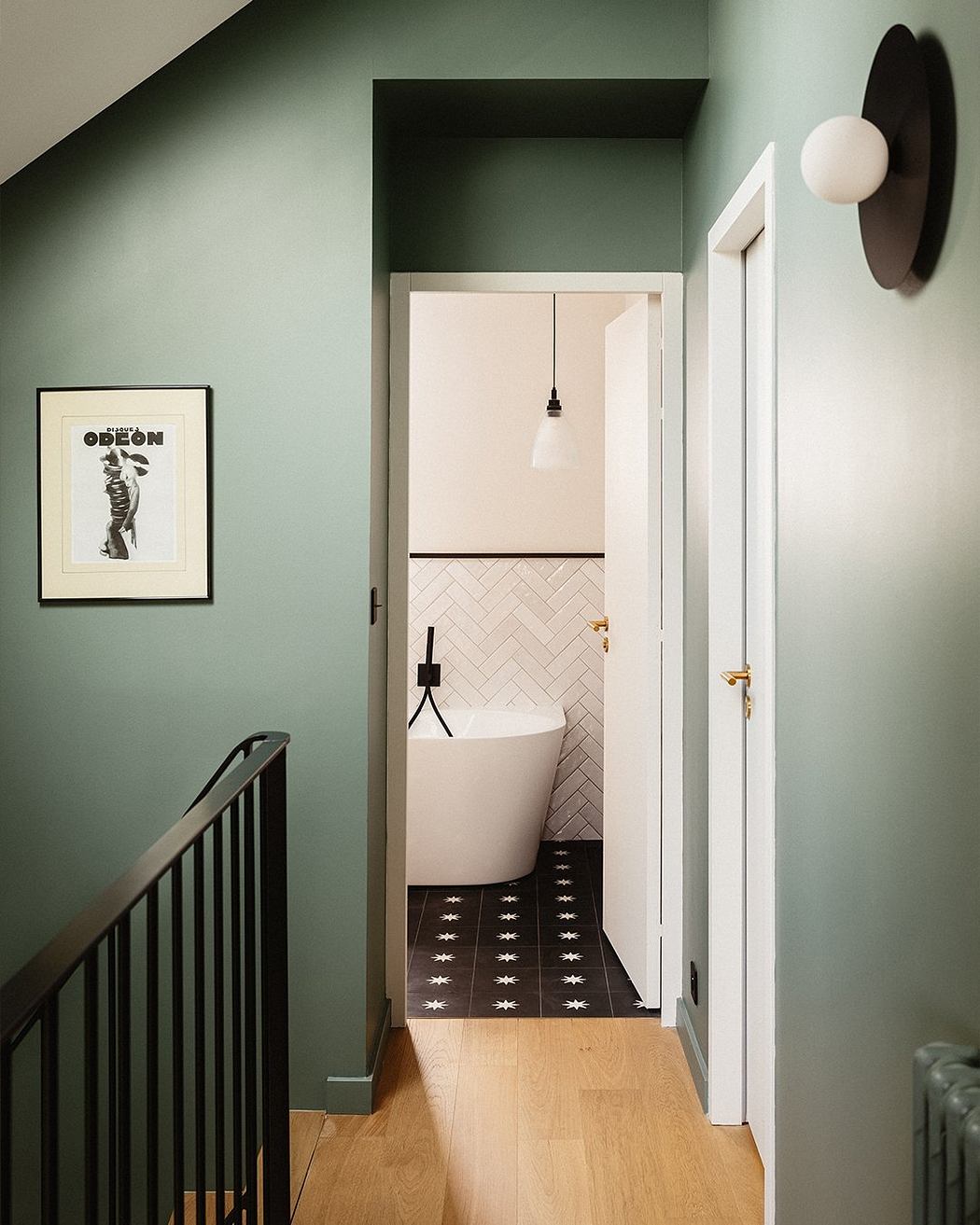Hallway with geometric patterned tiles, white vanity, and art framed on wall.