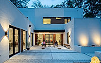 012-three-courtyard-house-by-habanero-unifies-concrete-and-stucco.jpg