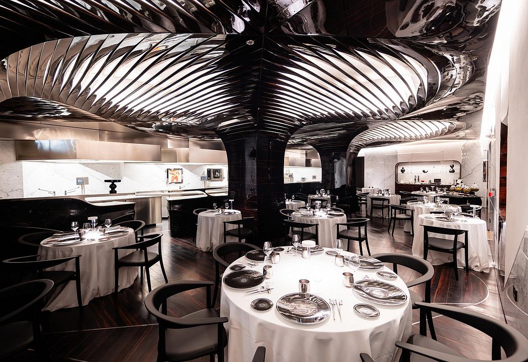 Dramatic architectural patterns and modern interior design elements in a restaurant.