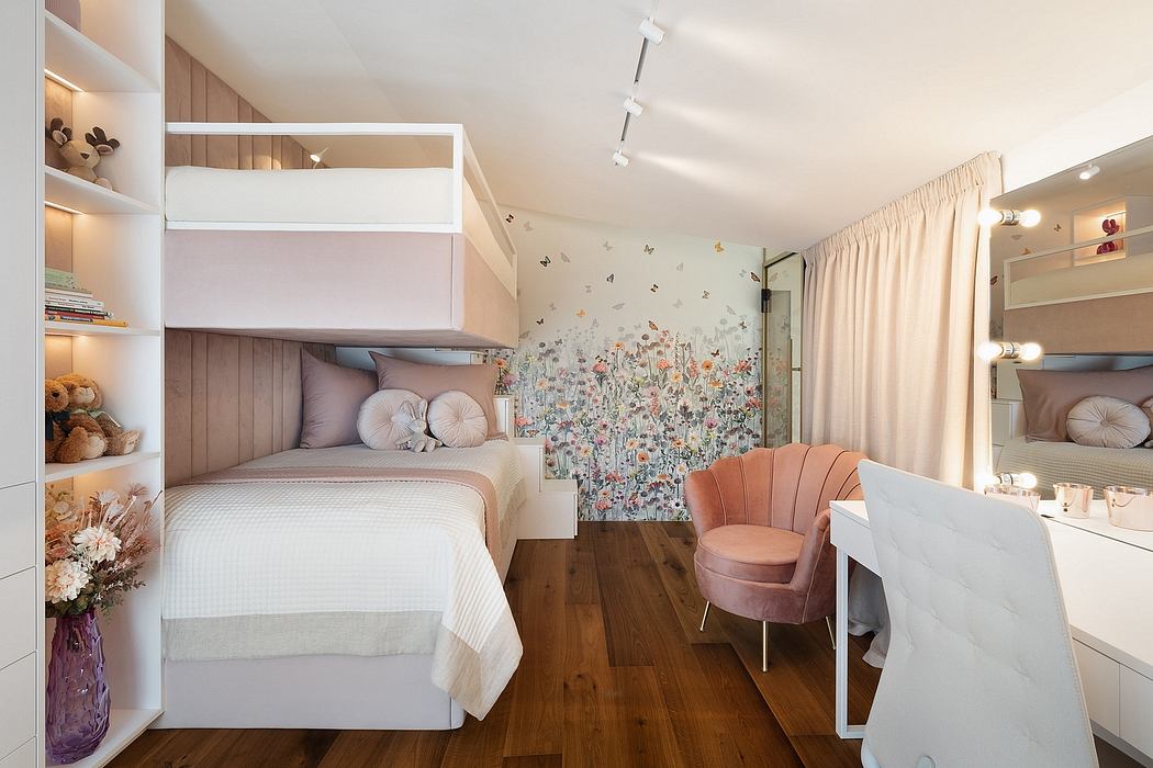 Cozy bedroom with built-in shelving, patterned accent wall, and stylish pink chair.