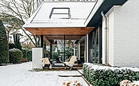 001-extension-villa-heuvelrug-adds-space-to-dutch-1970s-bungalow.jpg
