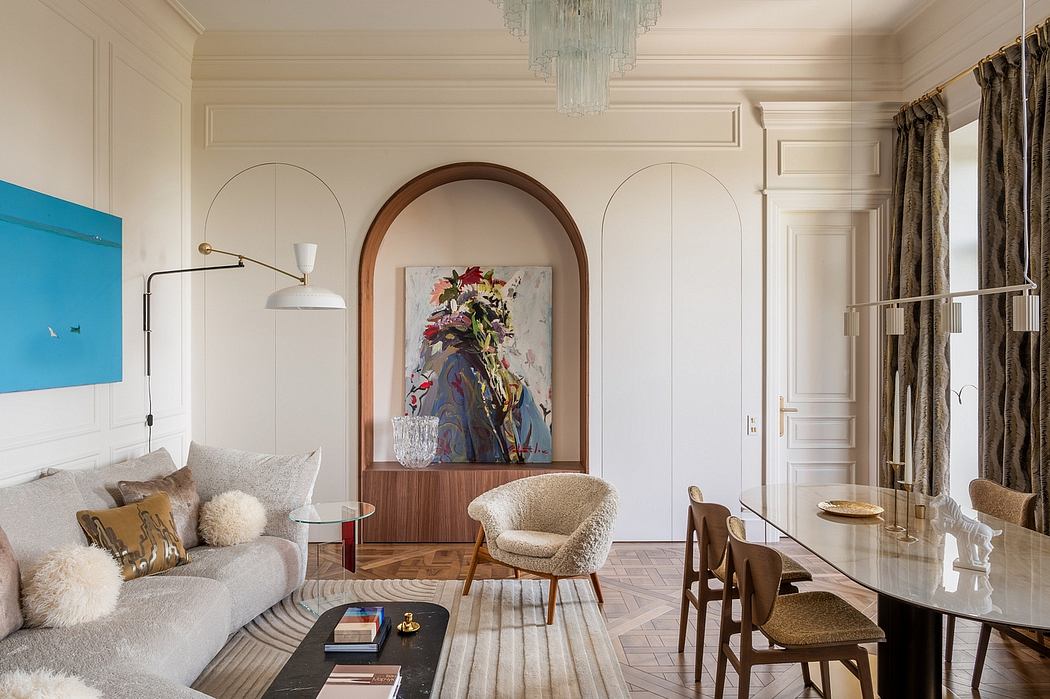 Elegant architectural details, plush furnishings, and a striking floral artwork create a refined, inviting ambiance.