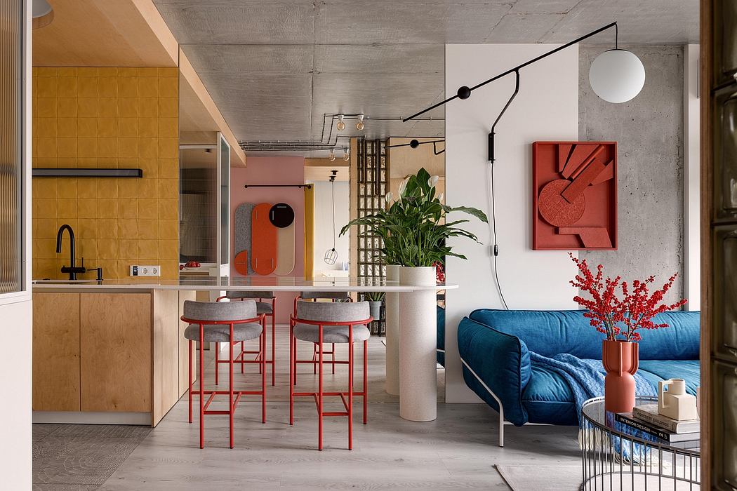 Modern loft-style interior with concrete walls, vibrant colors, and creative lighting.