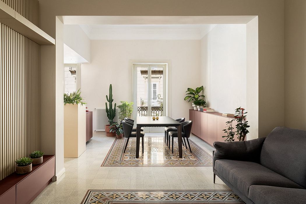 Spacious, modern dining area with patterned tile floor, potted plants, and minimalist furniture.