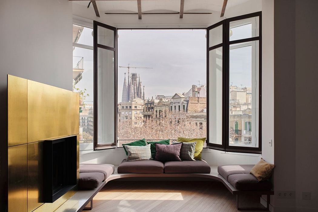 Modern apartment with panoramic city view, sleek furniture, and warm color palette.