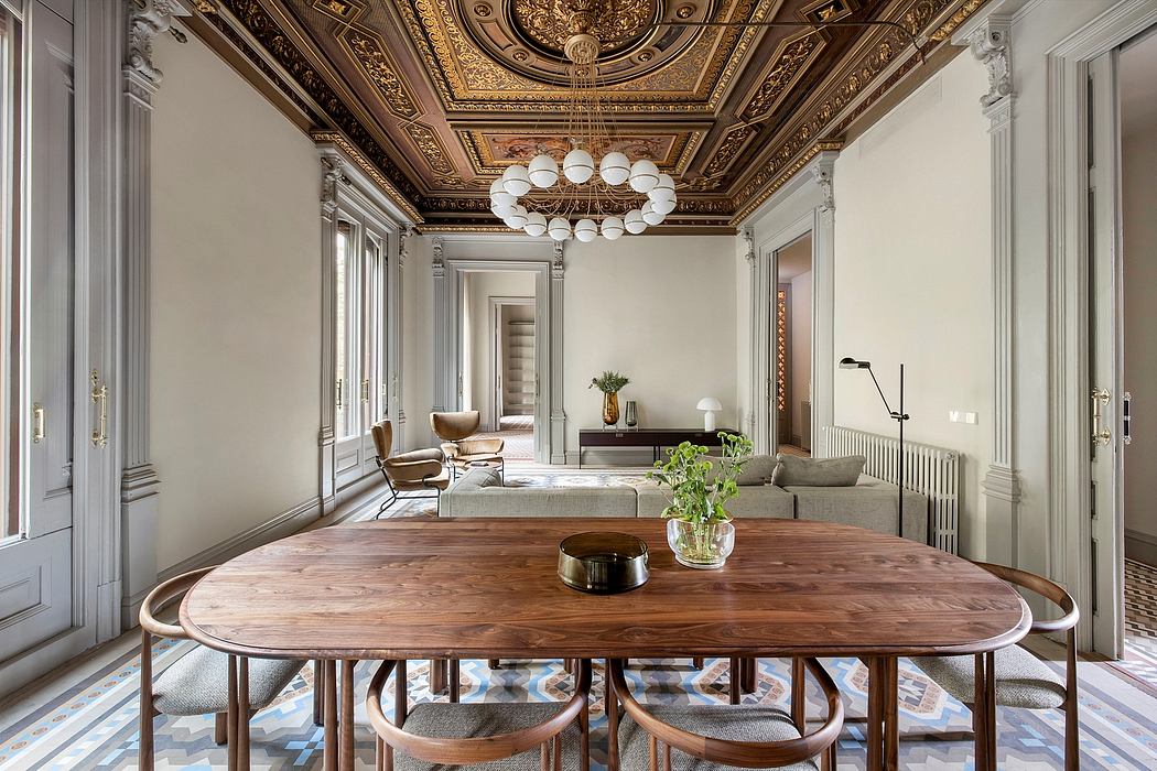 A luxurious, ornately decorated room with a grand, gilded ceiling and elegant furnishings.