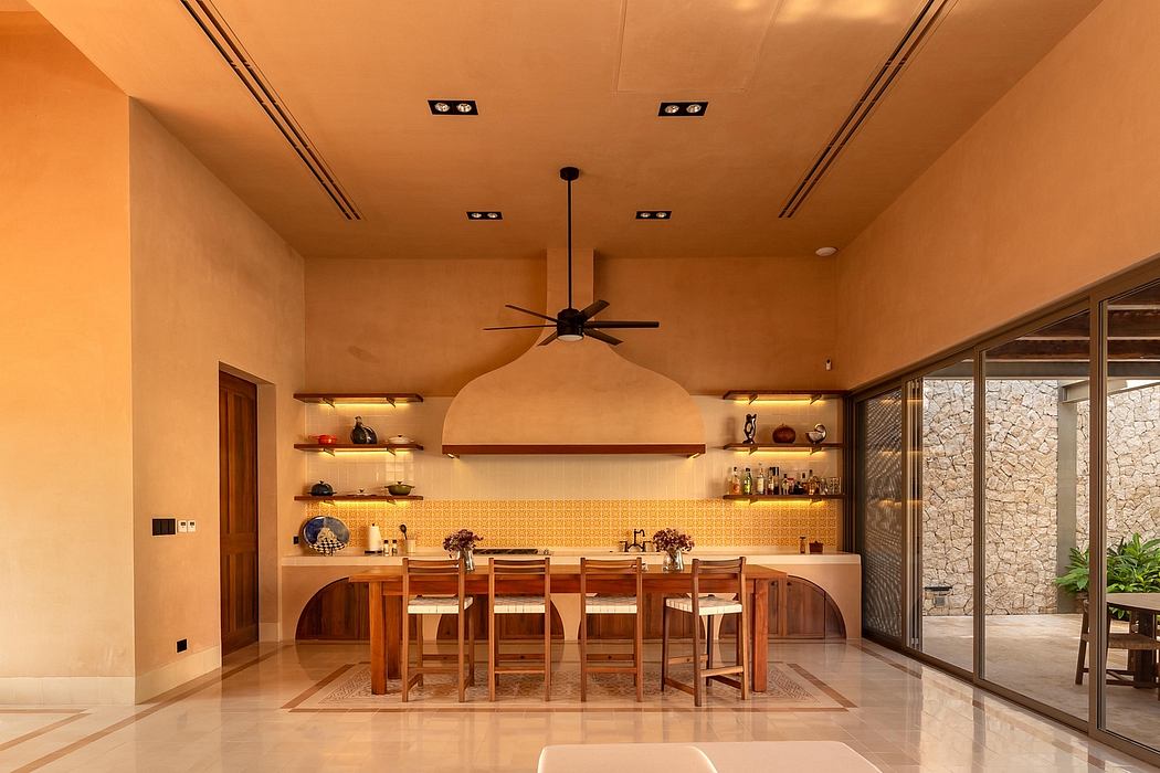 Warm, inviting kitchen with wood furniture, tiled backsplash, and a ceiling fan.