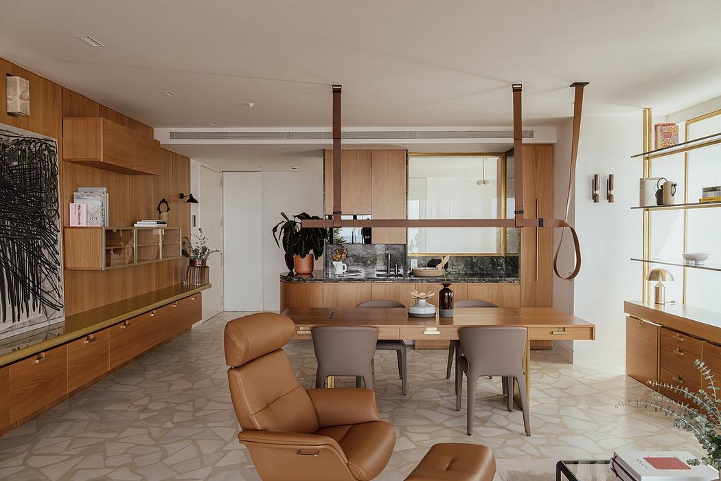 Spacious open-plan living area with warm wooden furnishings and modern decor elements.