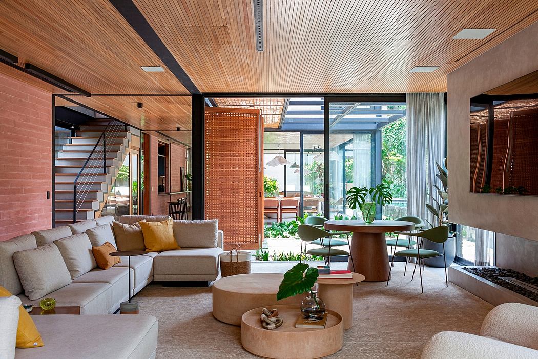 Expansive wood-paneled interior with glass walls, plush seating, and greenery-filled decor.