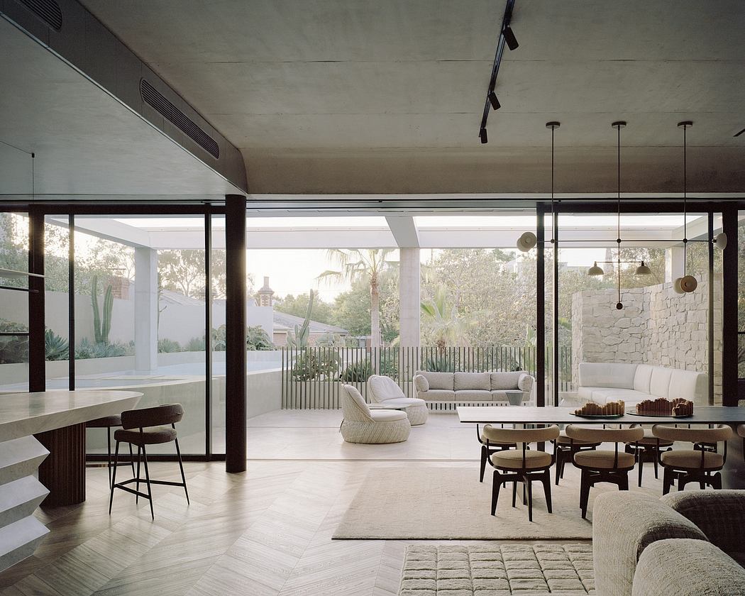 Airy, open-concept living space with seamless indoor-outdoor connection and clean, modern design.