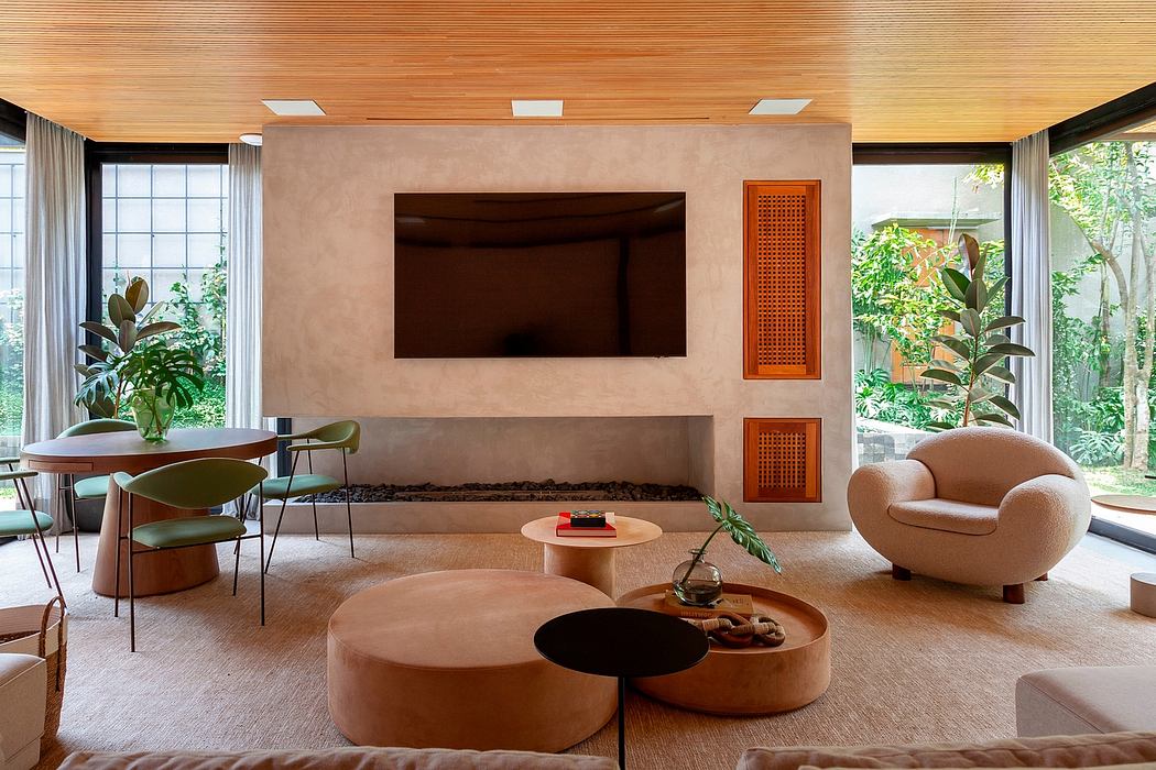 A modern, nature-inspired living room with warm, earthy tones, wood accents, and abundant greenery.