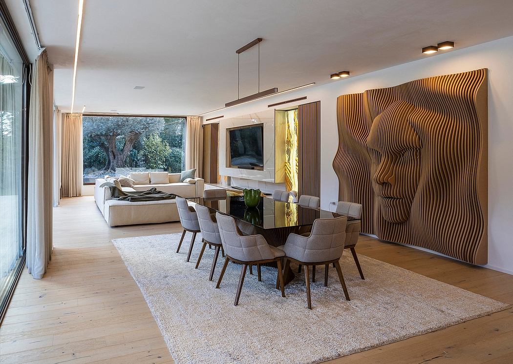 Spacious, modern living and dining area with sleek wooden wall panels, large windows, and plush furnishings.