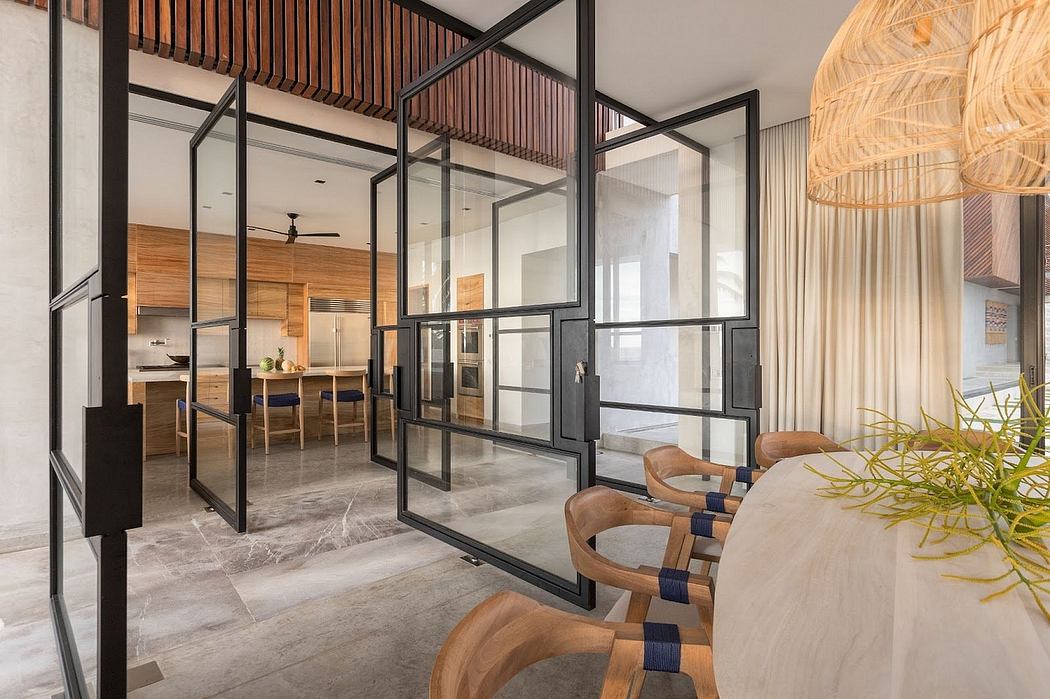 Sleek and modern interior design with glass partitions, wood accents, and plush seating.