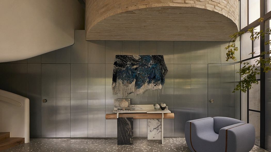 Rustic brick archway, modern tiled walls, marble and wood console, plush gray chair.