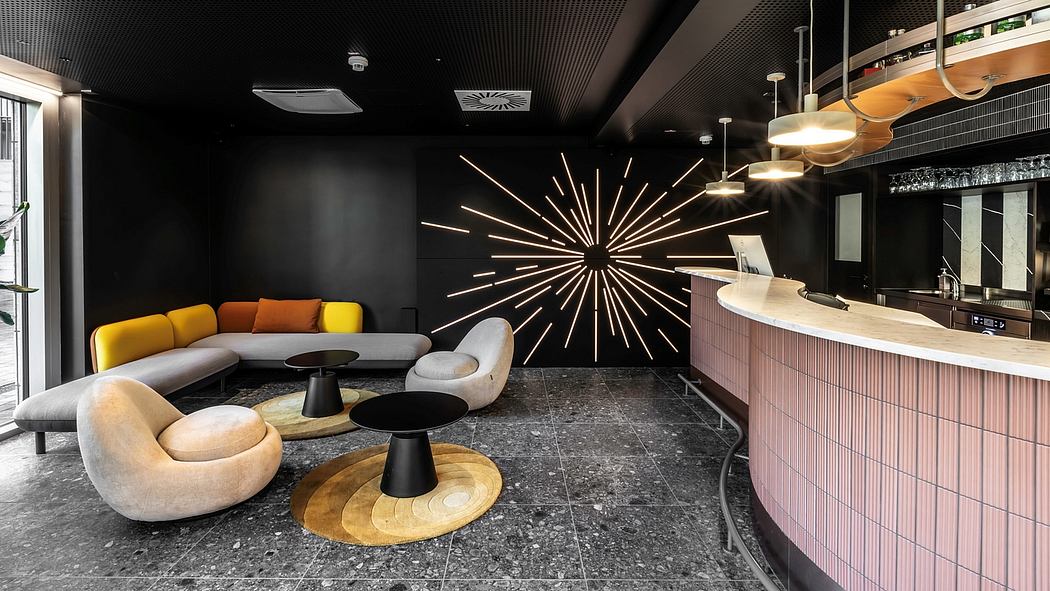 Chic modern lounge with vibrant seating, bold lighting, and sleek bar counter.