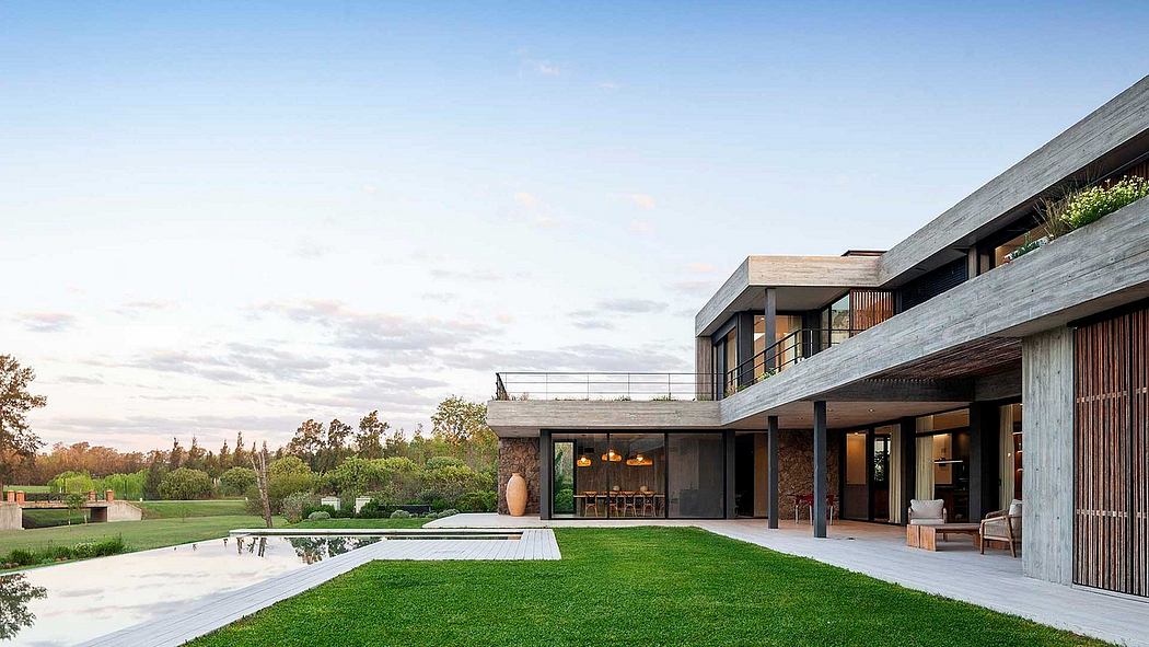 A modern, multi-level house with a pool, surrounded by lush greenery and a serene landscape.