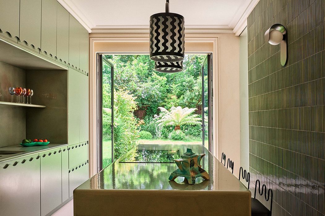 Tranquil kitchen with lush garden view, sleek green cabinets, and modern lighting.