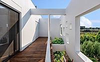 009-house-with-courtyards-draws-on-traditional-cypriot-residential-model.jpg