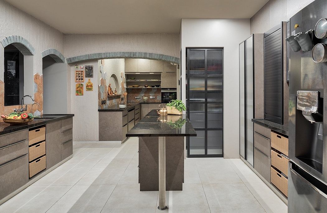 Modern kitchen with arched alcove, sleek cabinetry, and a central island with granite countertop.