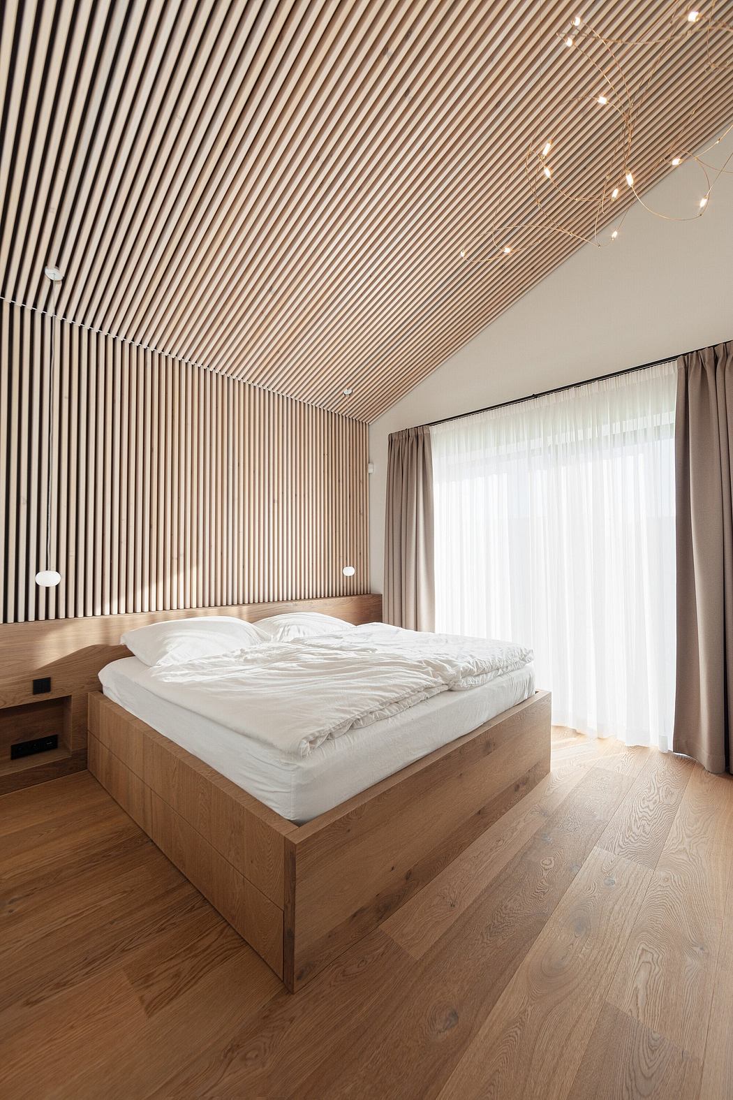 Minimalist bedroom with wooden slat wall, platform bed, and floor-to-ceiling windows.