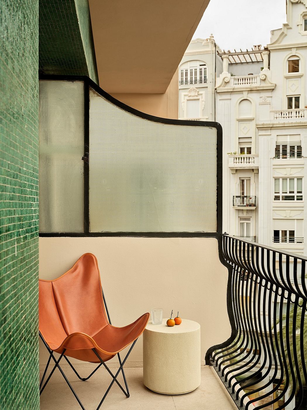 Cozy balcony with minimalist furniture, architectural details, and vibrant colors.