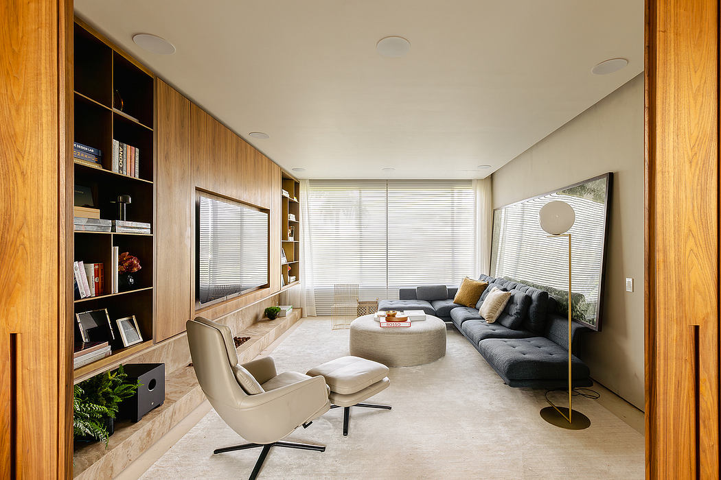 Sleek, modern living room with clean lines, wood paneling, and a cozy seating area.