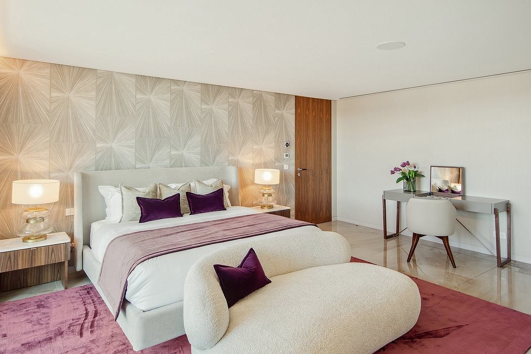 Elegant bedroom design with textured wall panels, plush furnishings, and a harmonious color palette.