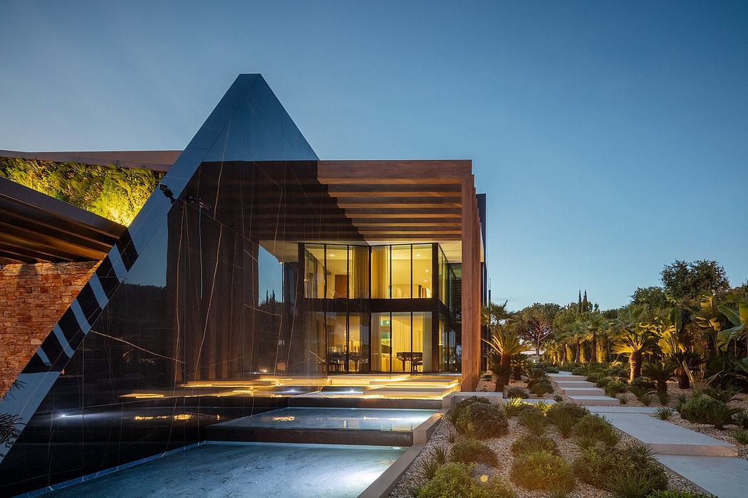 Modern architectural masterpiece with striking geometric design and glass walls.