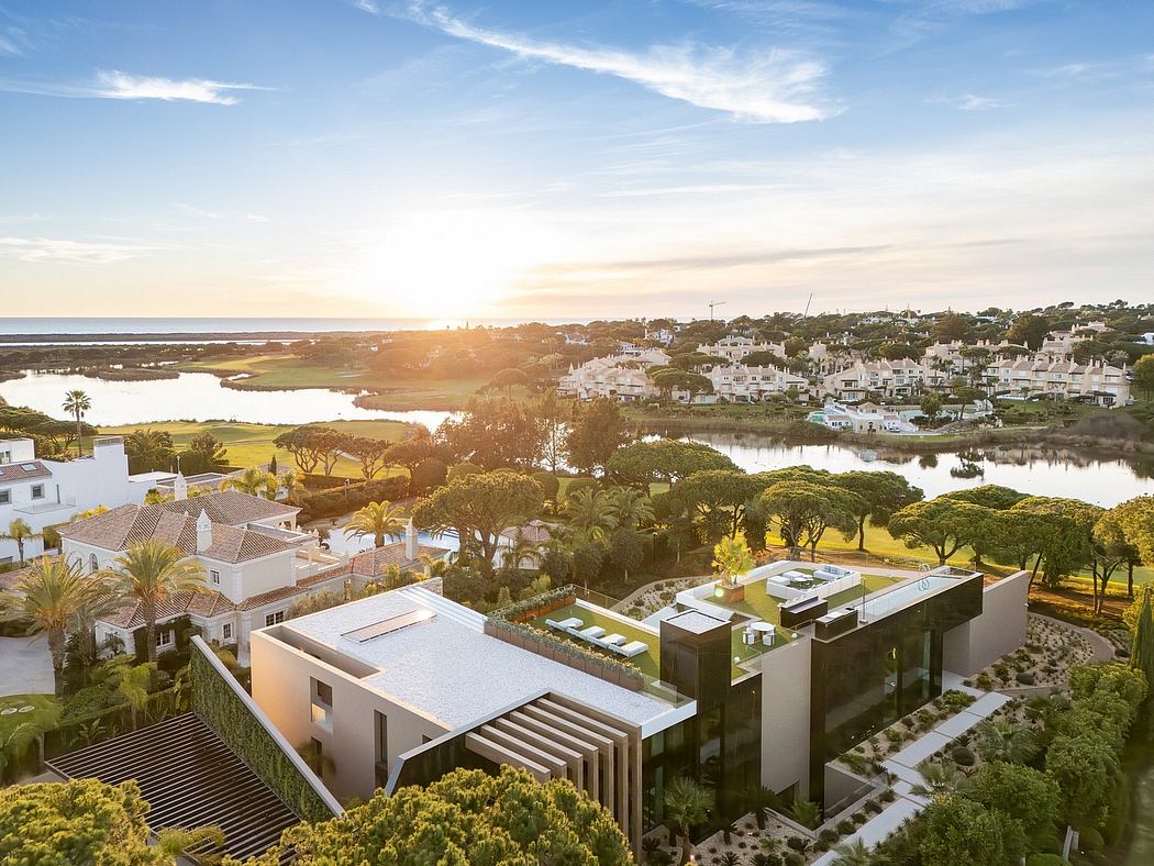 Stunning modern architecture set against a lush, coastal landscape.