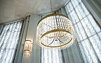 Chandelier in the registry office , hall or room with mosaics on the floor and beautiful lamps or chandeliers in the registry