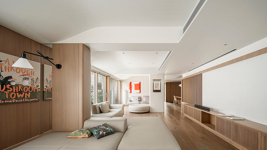 Sleek, modern interior with warm wood accents, plush seating, and vibrant artwork.