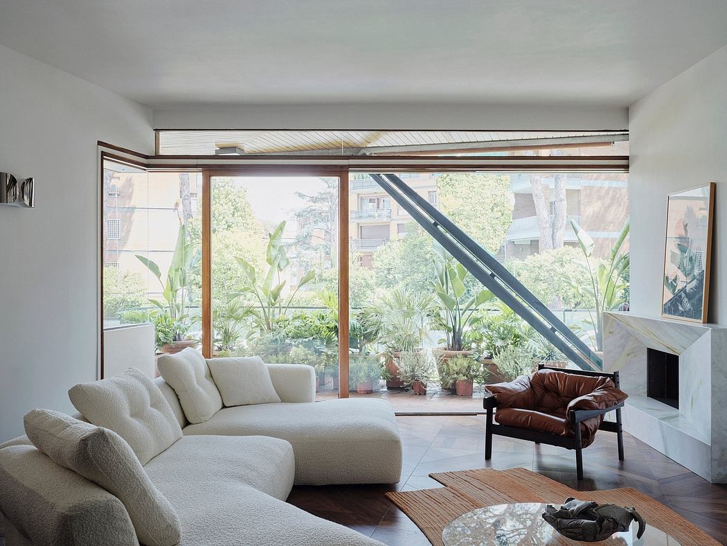 Spacious living room with floor-to-ceiling windows overlooking lush greenery and architectural details.