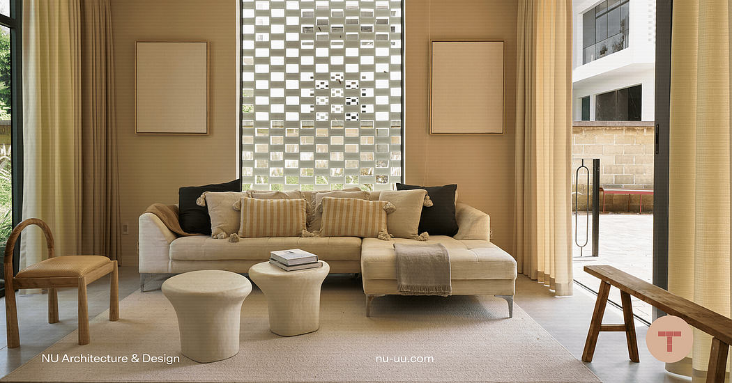 Spacious living room with neutral color palette, geometric wall art, and modern furniture.