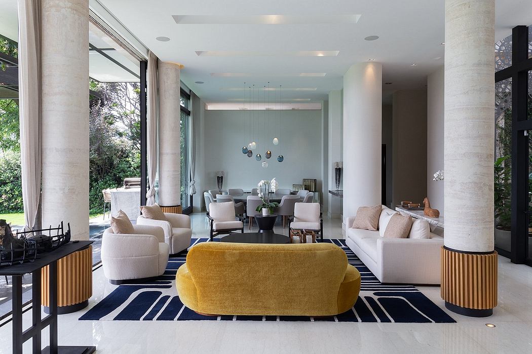 Sleek modern living room with floor-to-ceiling windows, minimalist decor, and geometric accents.