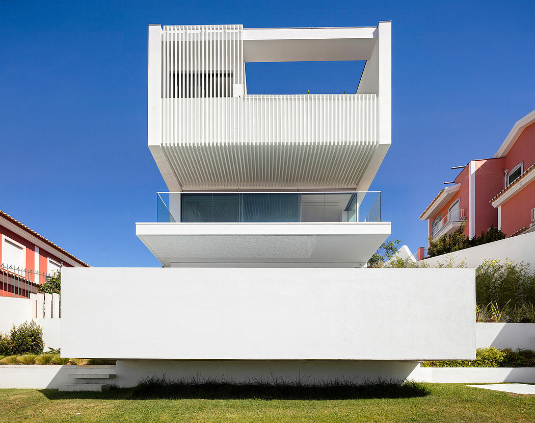 Striking modern architecture with clean lines, cantilevered balconies, and contrasting textures.