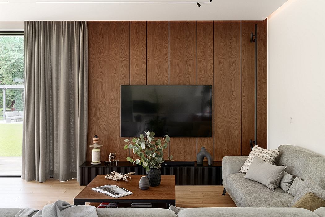 Cozy living room with wood-paneled walls, large TV, and minimalist furniture.