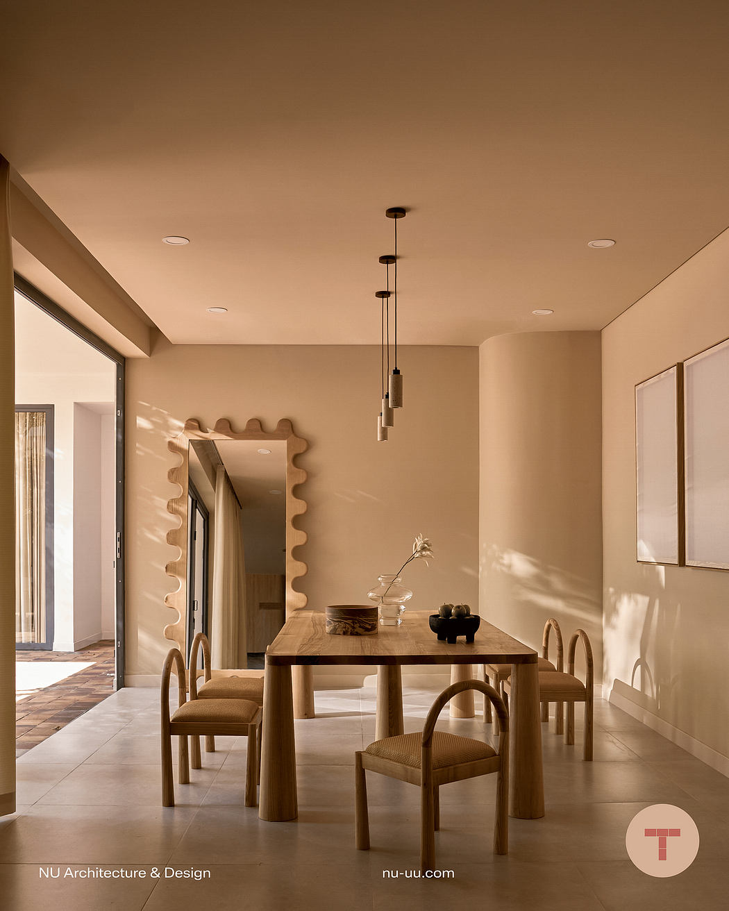 An elegant dining area with a wooden table, chairs, and a decorative mirror on the wall.