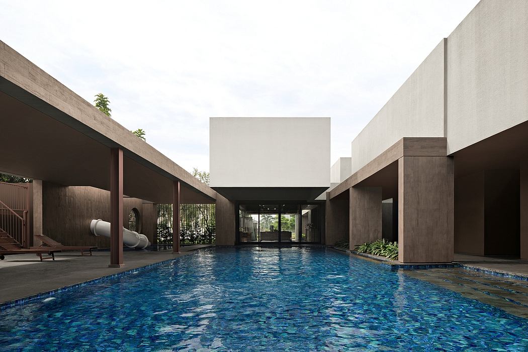 Expansive modern architectural complex centered around a swimming pool with lush greenery.