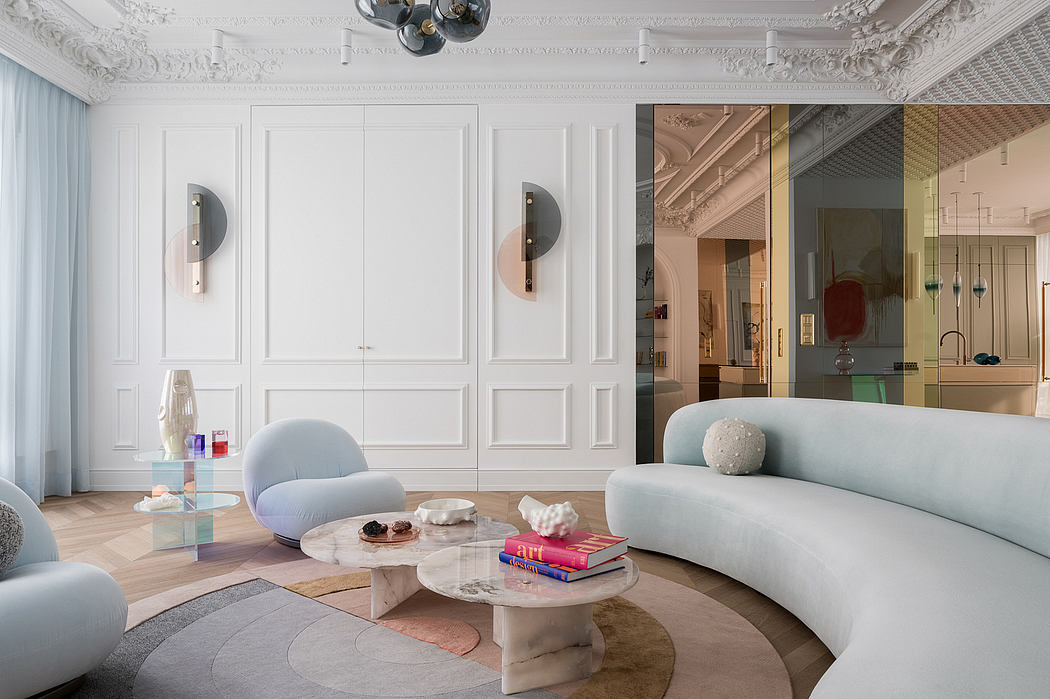 Elegant room with ornate ceiling, modern furnishings, and marble coffee table.