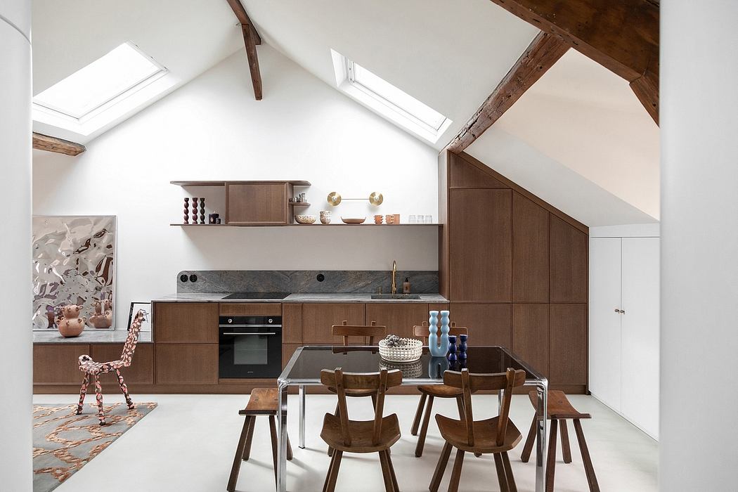 Bright, airy kitchen with exposed wooden beams, modern cabinets, and chic dining area.