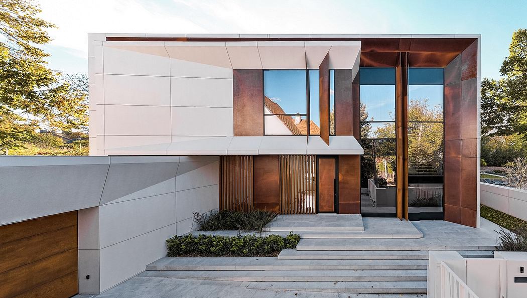 A modern, minimalist building with clean lines, wooden accents, and large glass windows.