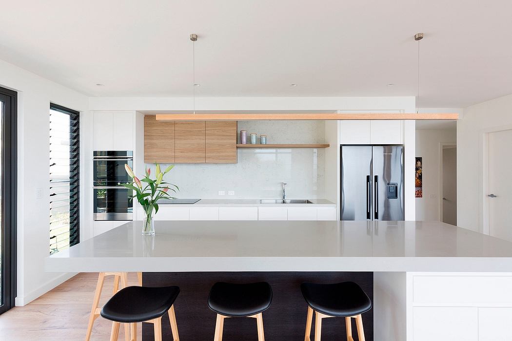 Modern kitchen with clean lines, wooden accents, sleek countertops, and a minimalist aesthetic.