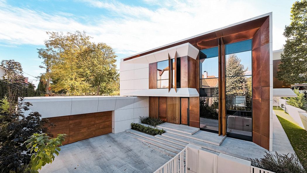 Sleek, modern home with geometric facade, wooden accents, and expansive glass windows.
