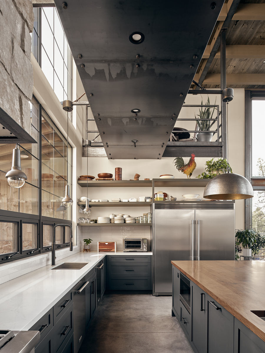 Rustic industrial kitchen with open shelving, stainless steel appliances, and natural textures.