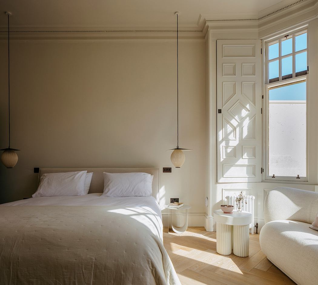 Serene bedroom with elegant architectural details, soft lighting, and neutral color palette.