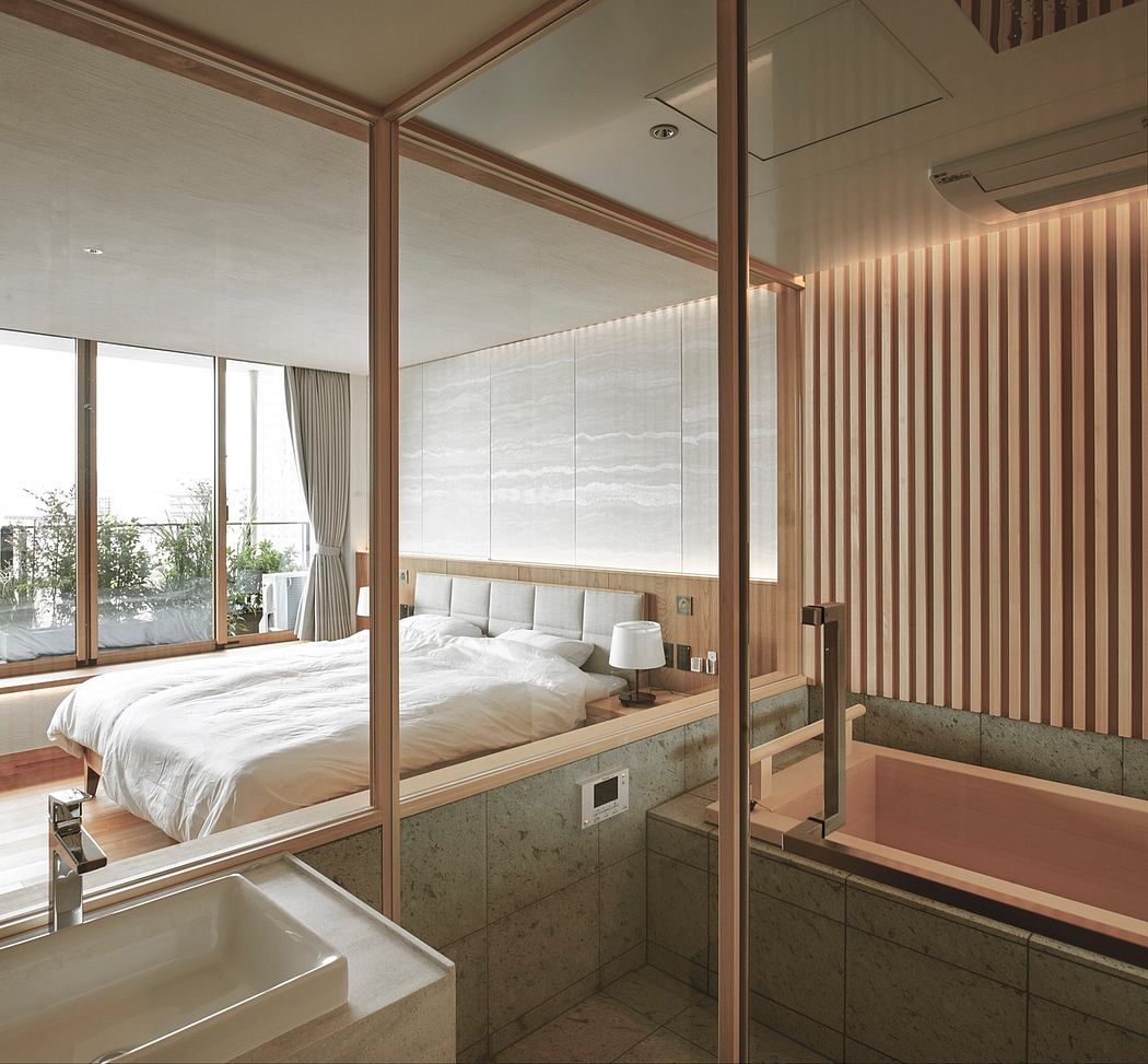 Minimalist bedroom with clean lines, natural materials, and large windows.