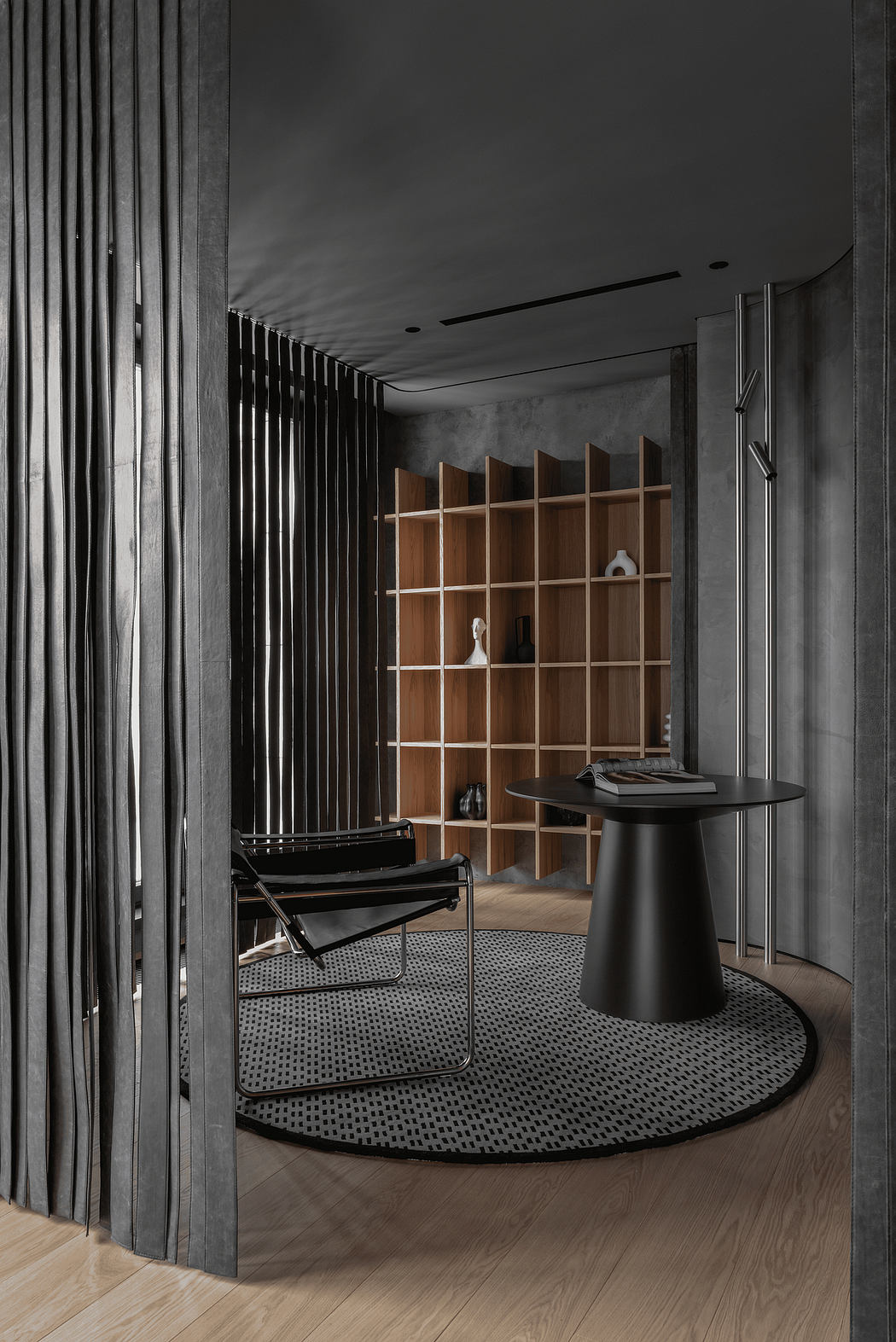 A sleek, minimalist interior with a wooden shelving unit, circular rug, and a modern black chair.